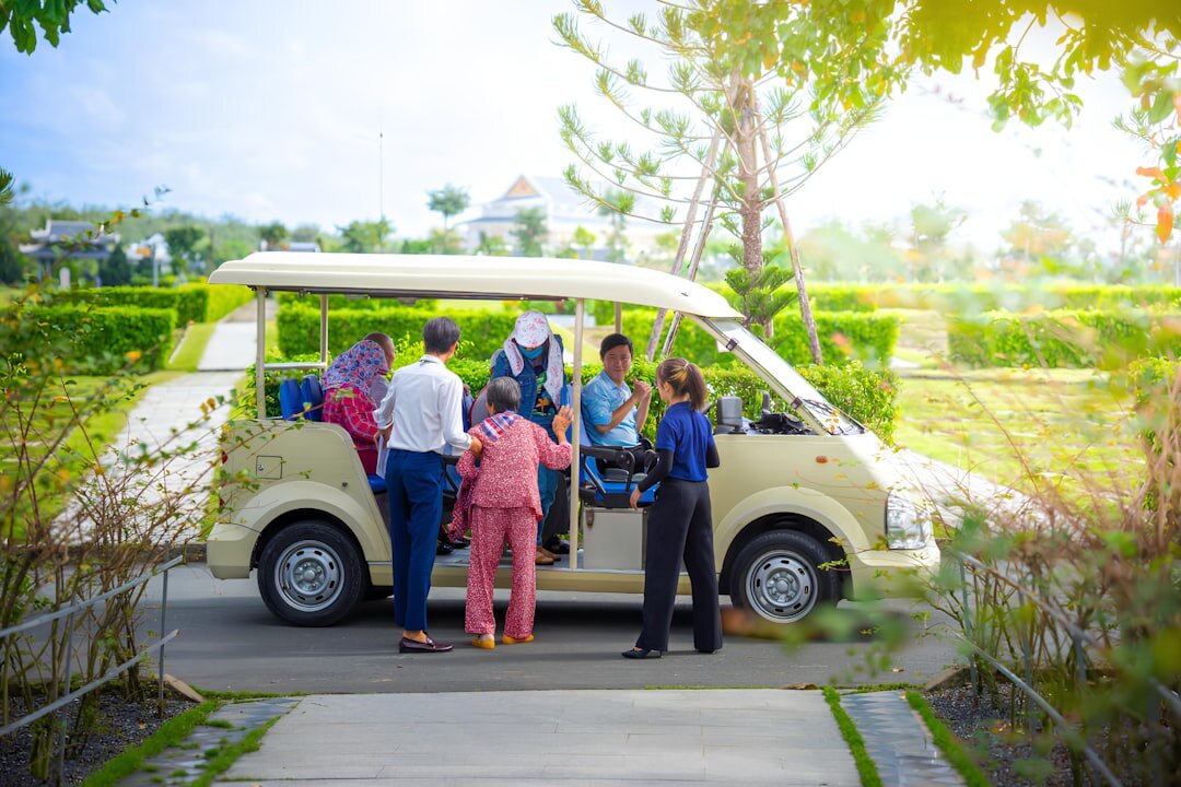 Group of seniors boarding a tour bus for an excursion