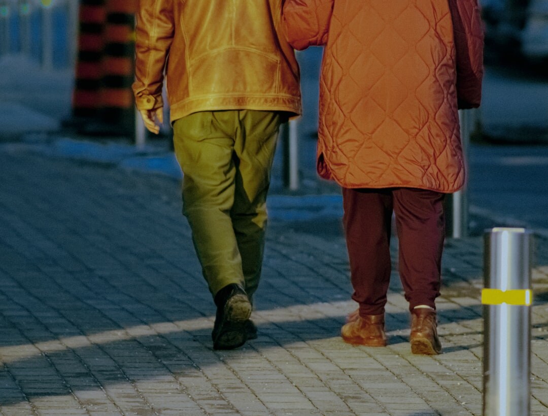 elderly couple walking