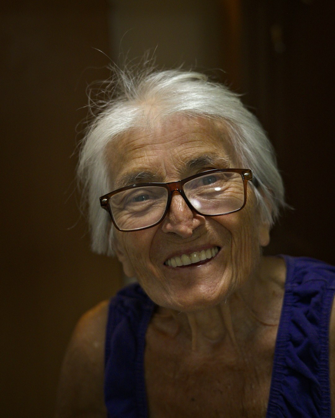 Portrait of a smiling senior woman with glasses