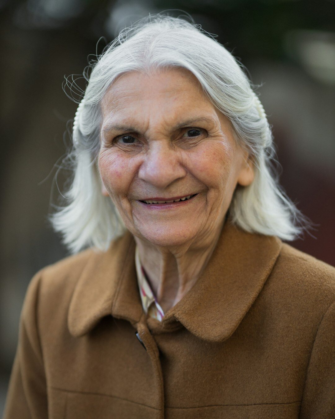 Portrait of a smiling senior woman with grey hair