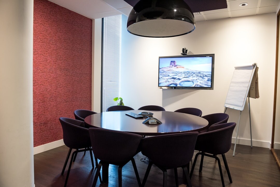 Bright community center meeting room with people gathered
