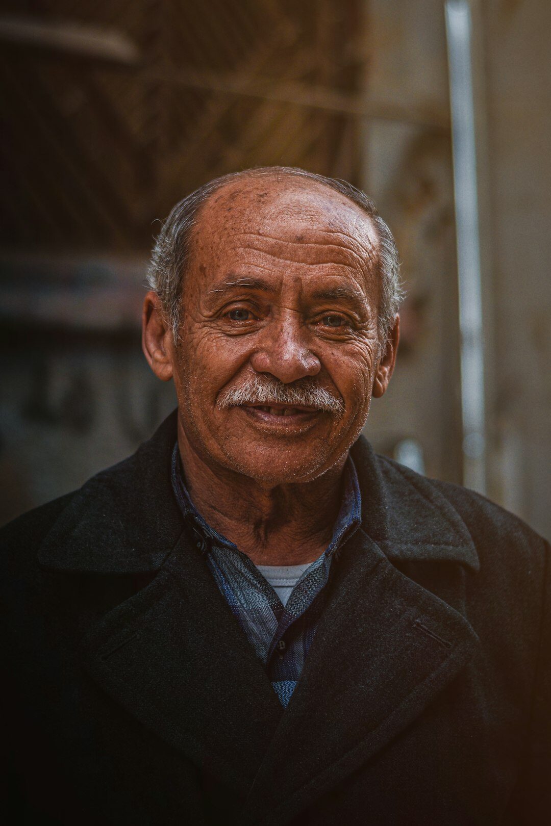 Portrait of a cheerful senior man member