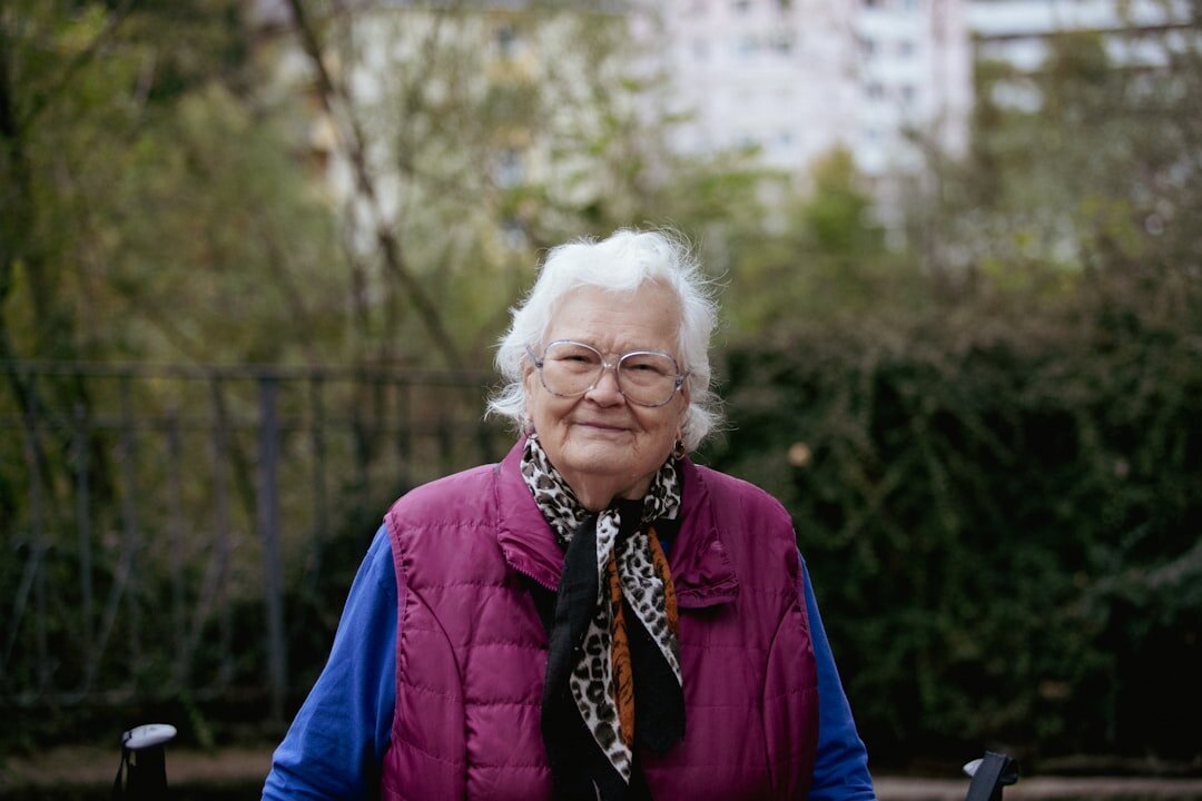 Portrait of a cheerful senior woman member